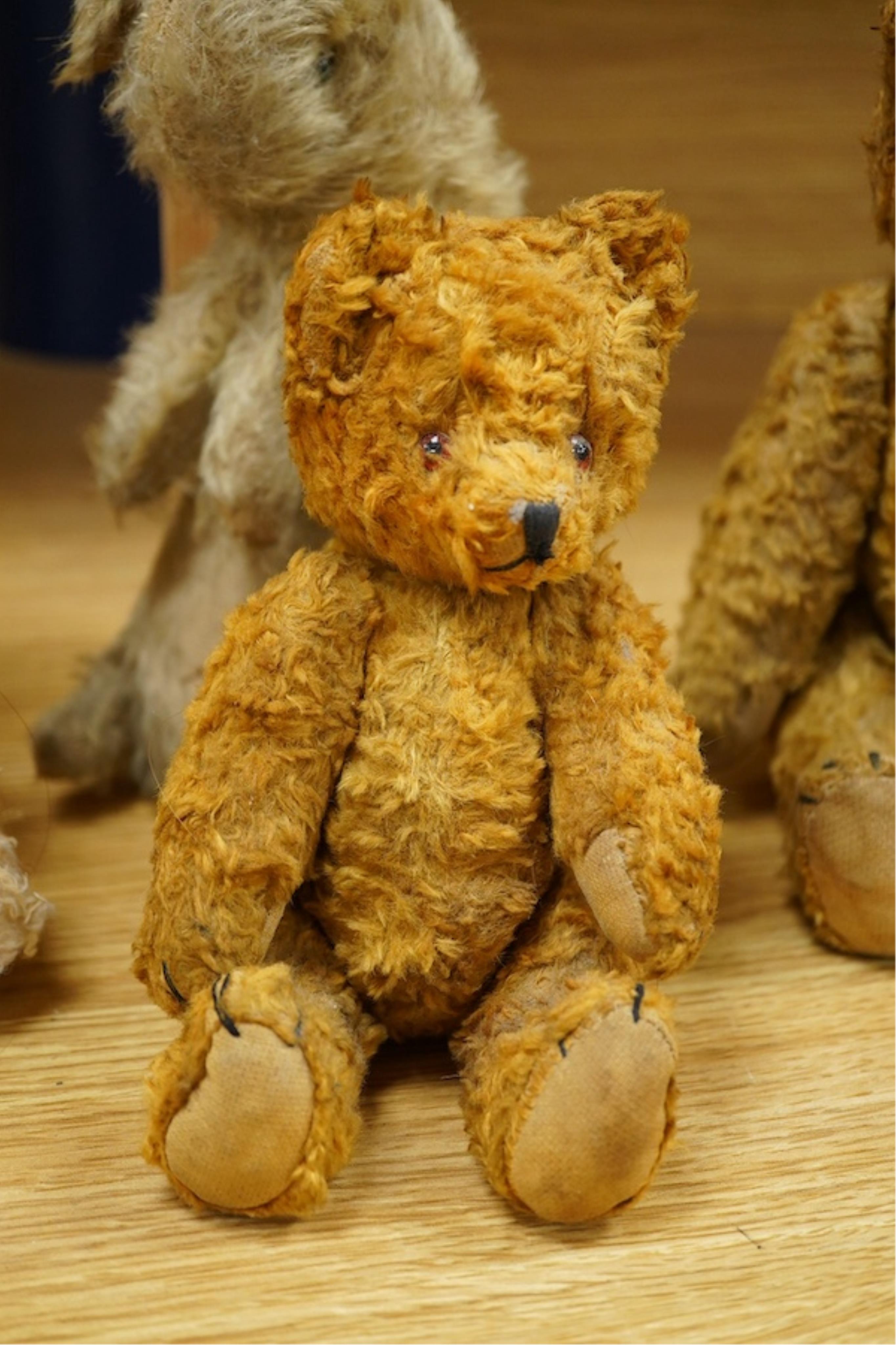 Three vintage teddy bears and a rabbit, three with jointed limbs, largest 28cm high. Condition - fair